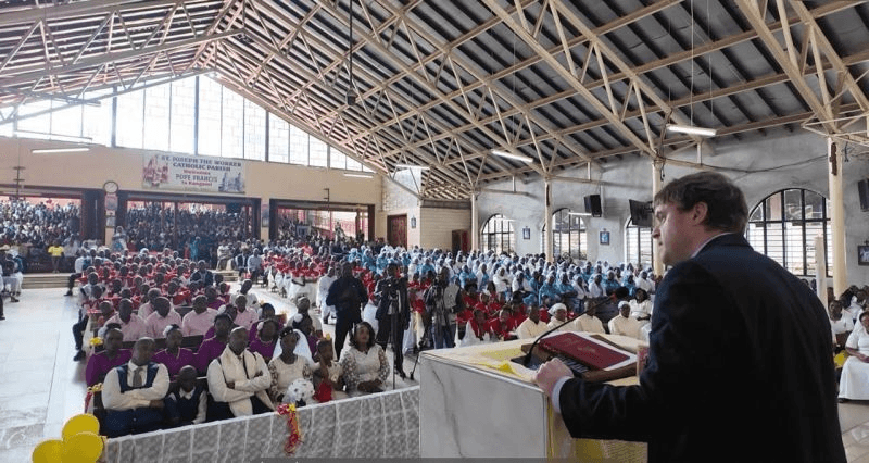 Catholic Token™ co-founder addressing the community at St. Joseph the Worker Parish in Kangemi